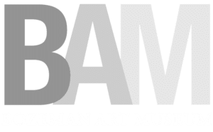 Large, bold, gray letters BAM fill most of the image, with the words Bozeman Art Museum in smaller, lighter text underneath—a simple and minimalist design on a light background inspired by Montana’s cattle ranch landscape.