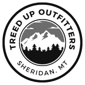 Circular logo for Treed Up Outfitters, featuring mountains, trees, and clouds in black and white, with “Treed Up Outfitters” around the top and “Sheridan, MT” at the bottom—perfect for those seeking land for sale or a cattle ranch.