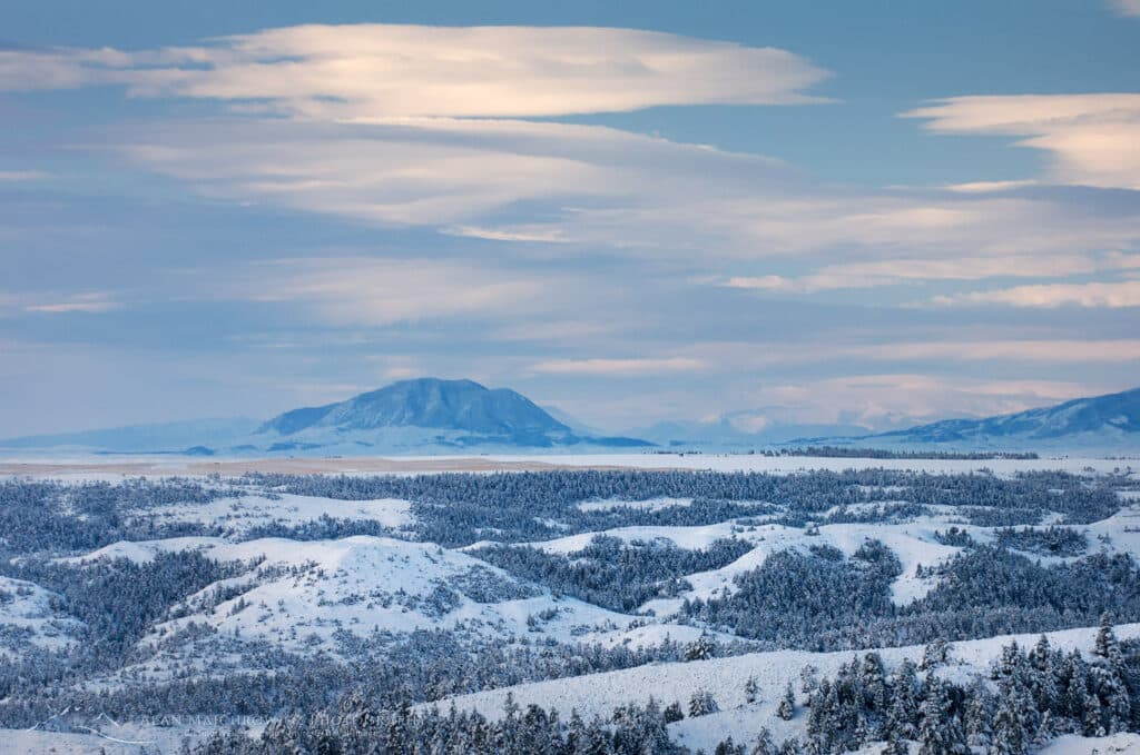Fresh snow cloaks the plains near the Bear Paw Mountains of Montana